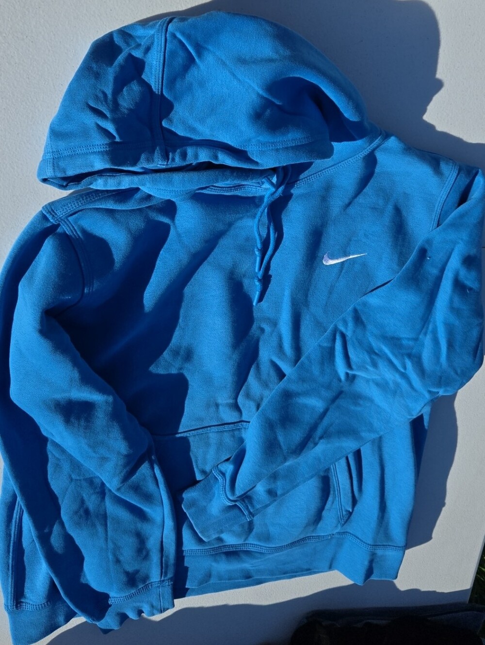 Nike Blue Hoodie with White Swoosh